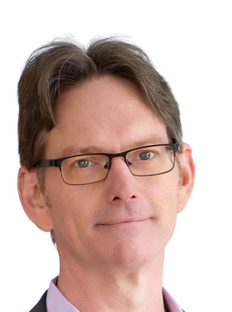 Headshot of a middle-aged man with glasses, available at Scale Community Events for professional networking.